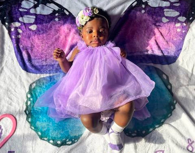 Rihanna is registered to the contest to win money with this photo: art, baby, baby_toddler_clothing, butterfly, dress, event, fashion_accessory, fictional_character, fun, hair_accessory, happy, headgear, headpiece, magenta, mythical_creature, person, pink, pollinator, purple, toddler