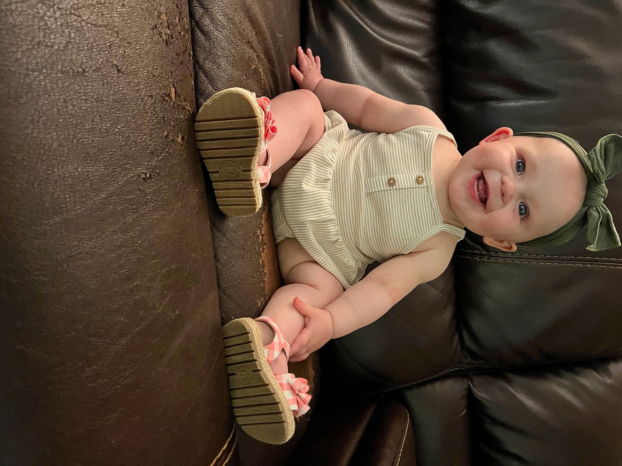 Oaklynn is registered to the contest to win money with this photo: baby, baby_toddler_clothing, comfort, cool, eye, facial_expression, finger, flash_photography, gesture, happy, human_body, joint, joy, leg, lip, mouth, person, skin, smile, thigh