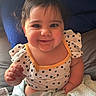 Arya joined the competition — help win amazing prizes! baby, child, smiling, polka_dot, blanket, cushion, blue, cute, pigtails, indoors, portrait, happy, clothing, infant, person, seated, face, hand, soft, cozy