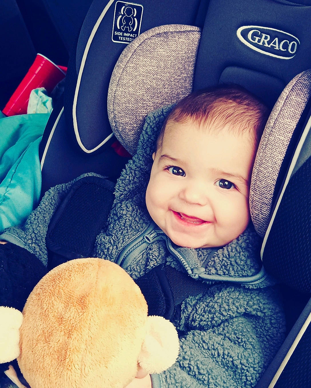 Scarlet is registered to the contest to win money with this photo: baby, baby_in_car_seat, blue, cap, car_seat, child, cool, ear, eye, hand, happy, hat, head, headgear, joy, love, person, product, skin, sky