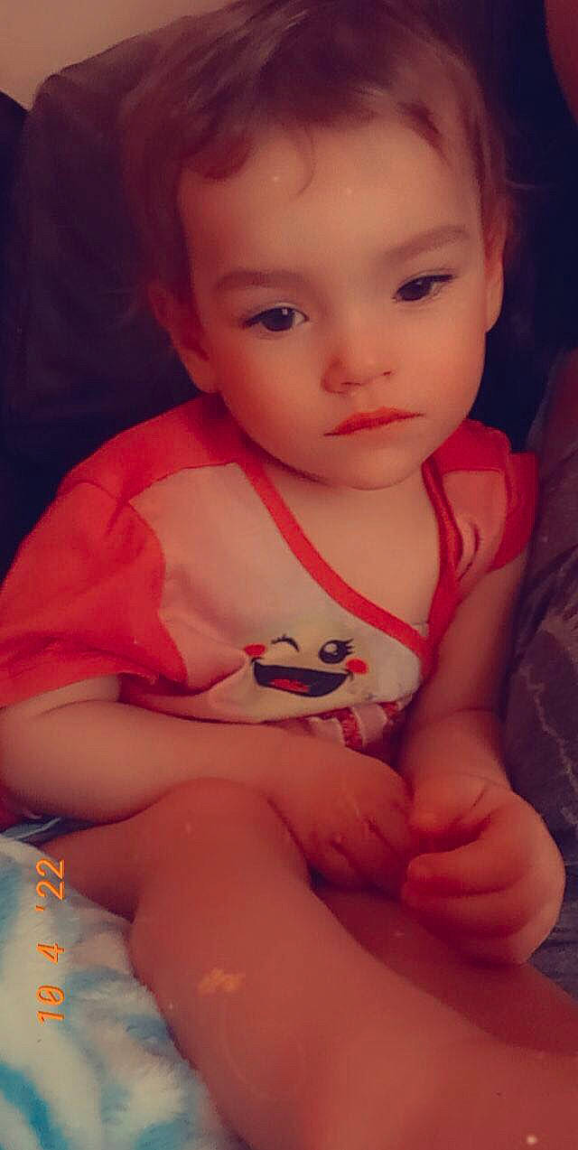 Aria is registered to the contest to win money with this photo: arm, baby_toddler_clothing, cheek, chin, eye, eyebrow, eyelash, finger, flash_photography, gesture, hand, happy, human_body, iris, leg, lip, mouth, neck, nose, person