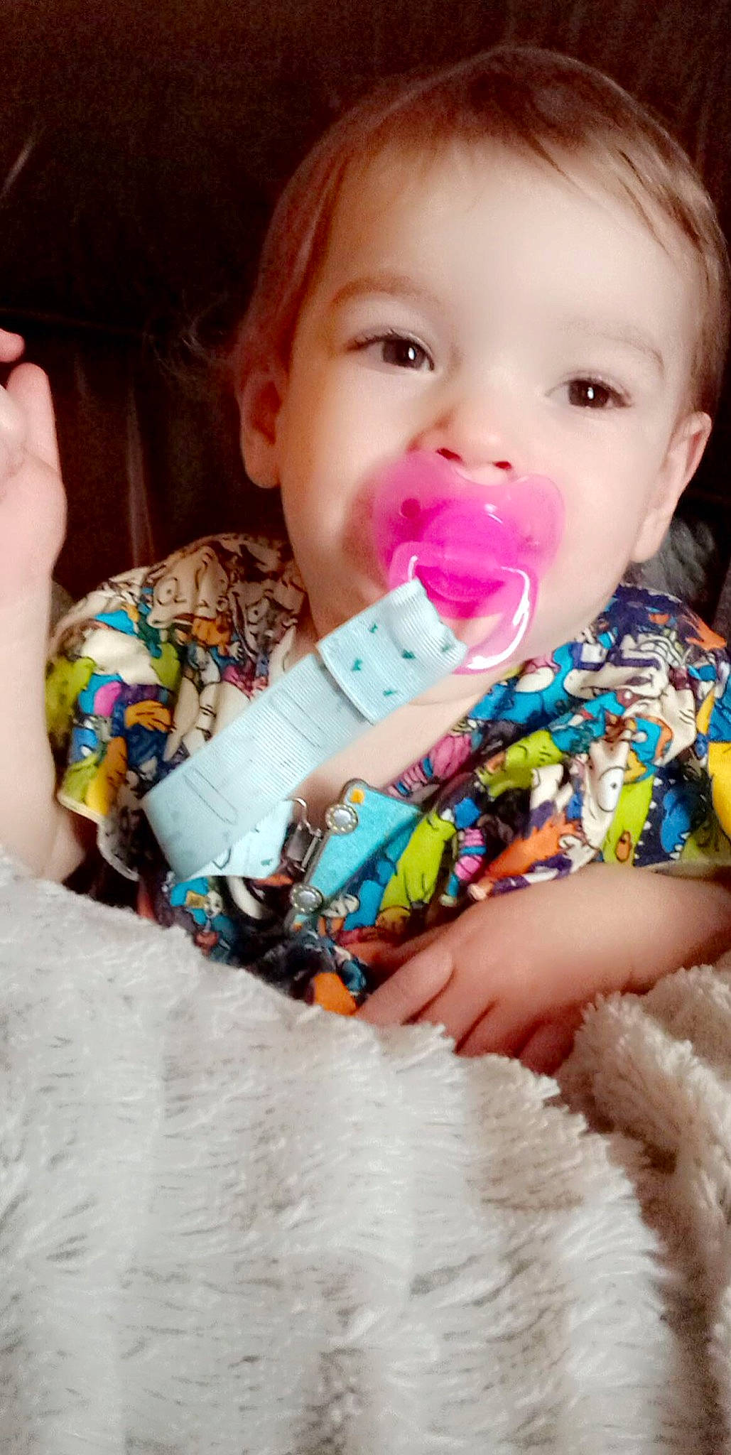 Aria is registered to the contest to win money with this photo: baby_grabbing_for_something, baby_playing_with_food, baby_toddler_clothing, cheek, drinkware, eyelash, face, facial_expression, finger, gesture, happy, iris, lip, mouth, nose, person, pink, plastic_bottle, product, skin