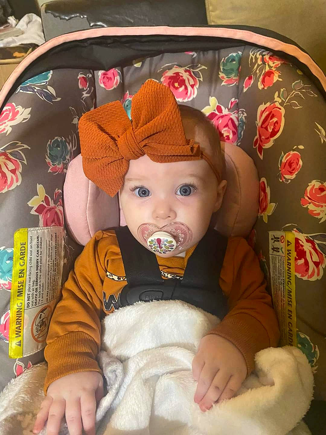 Jordyn joined the competition — help win amazing prizes! baby, baby_products, baby_toddler_clothing, beanie, brown, cap, cheek, child, comfort, costume_hat, fashion_accessory, fedora, headwear, knit_cap, linens, peach, person, pink, sitting, sleeve