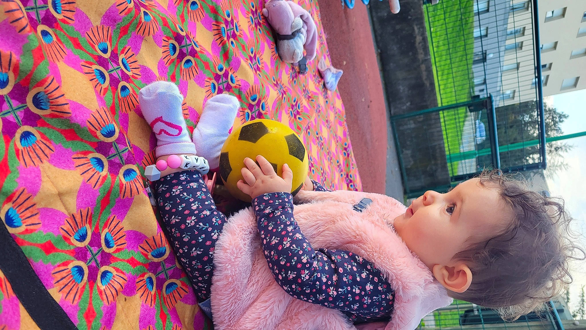 Kyra participe au concours pour gagner de l'argent avec cette photo : baby, ball, child, event, football, fun, grass, happy, leisure, mesh, pattern, person, pink, play, recreation, room, stuffed_toy, textile, toddler, toy