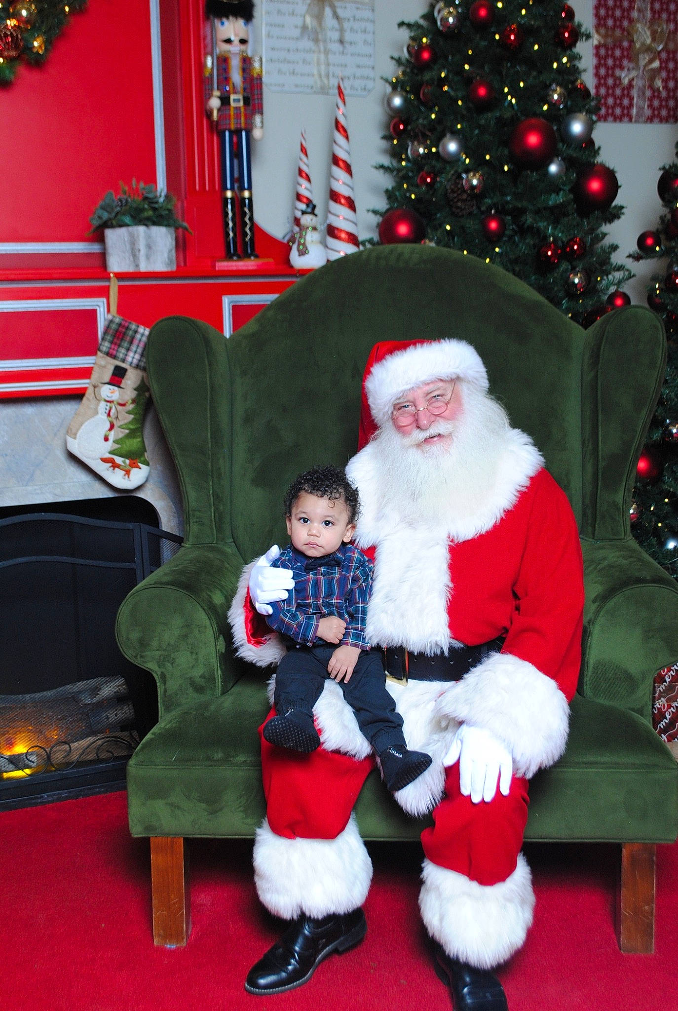 Joaquin joined the competition — help win amazing prizes! beard, christmas, christmas_decoration, christmas_ornament, christmas_tree, event, green, hat, headwear, holiday, human_body, lap, light, person, photograph, plant, red, santa_claus, snapshot, toddler