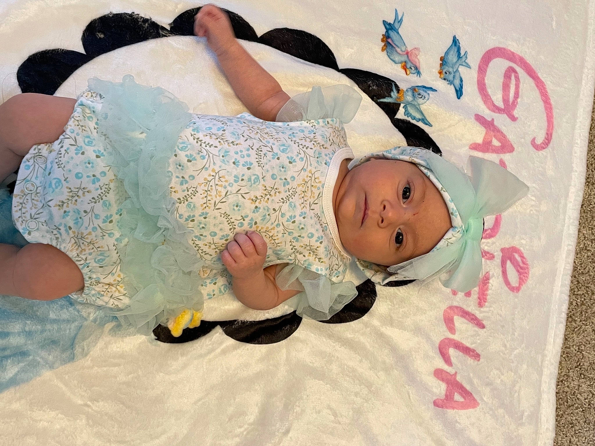 Gabriella joined the competition — help win amazing prizes! baby, baby_products, baby_toddler_clothing, barefoot, child, comfort, flooring, fun, happy, headwear, human_leg, leisure, linens, pattern, person, pink, room, skin, smile, textile