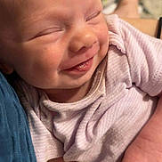 Melody joined the competition — help win amazing prizes! baby, infant, smiling, face, close_up, person, hand, clothing, skin, newborn, cute, happy, sleepy, portrait, holding, soft, toddler, child, warmth, comfort