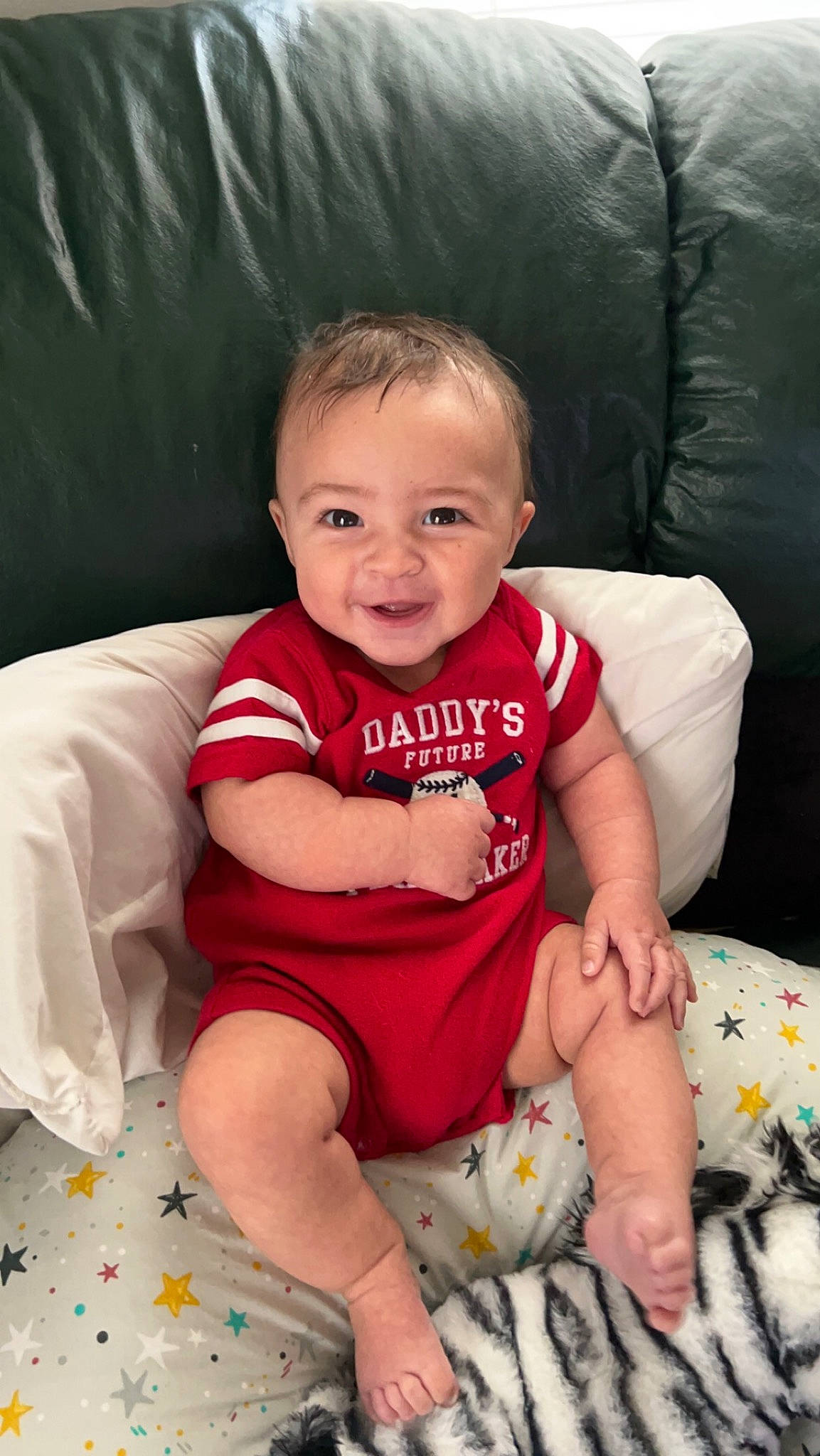 Dior joined the competition — help win amazing prizes! baby, baby_toddler_clothing, cheek, child, comfort, couch, fun, happy, human_leg, iris, lap, leg, linens, person, sitting, skin, smile, t_shirt, thigh, toddler