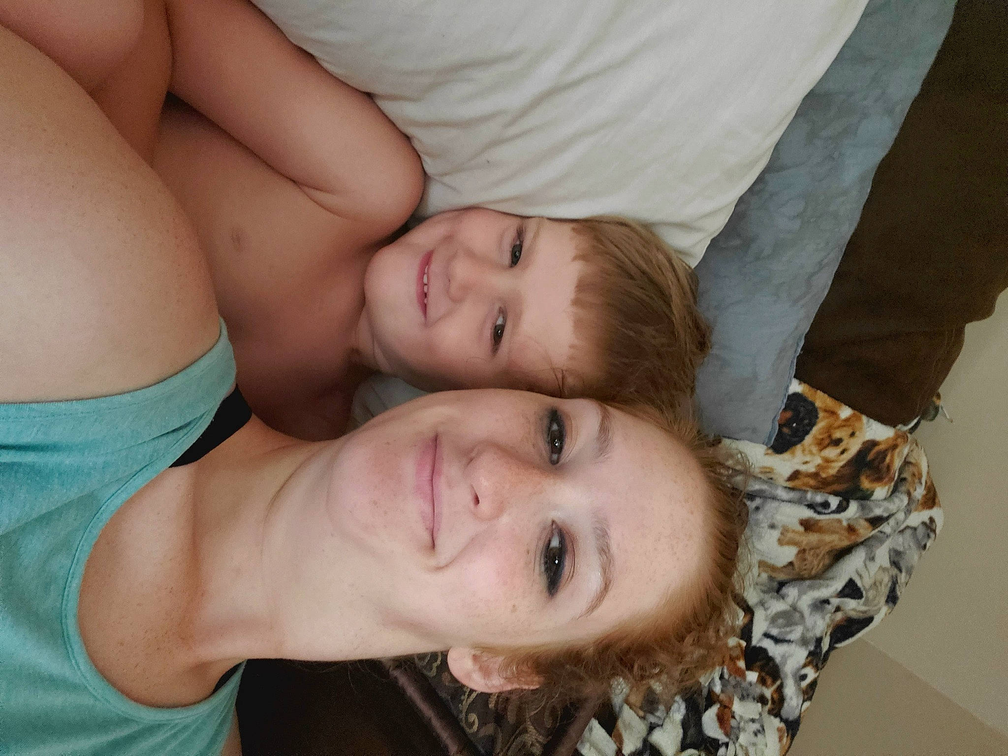 Kian is registered to the contest to win money with this photo: arm, black_hair, cheek, chest, child, ear, eye, face, head, joy, mouth, muscle, neck, nose, person, skin, sleep, smile