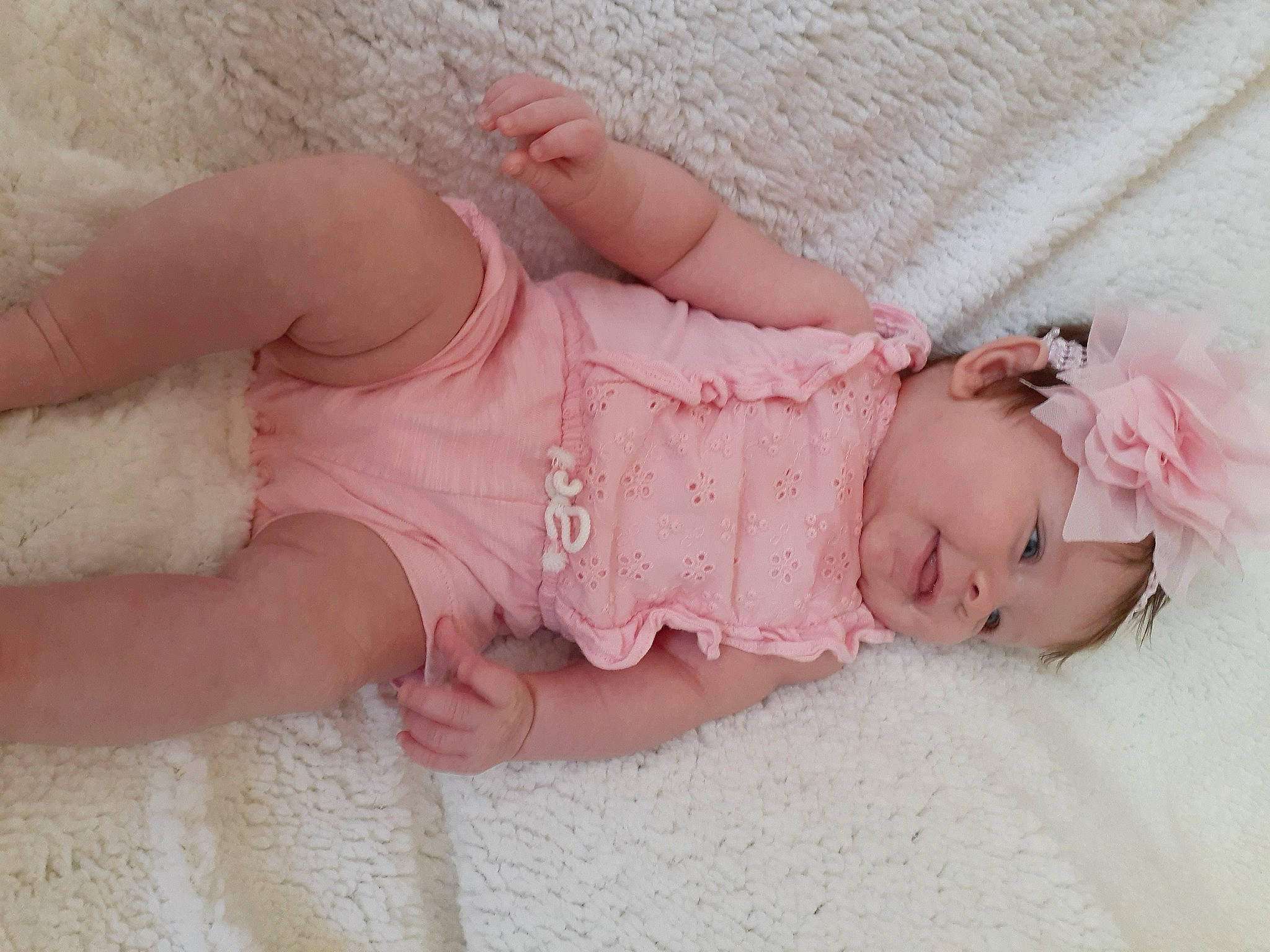 Molly is registered to the contest to win money with this photo: baby, baby_toddler_clothing, child, finger, hand, headwear, person, pink, product, skin, toddler