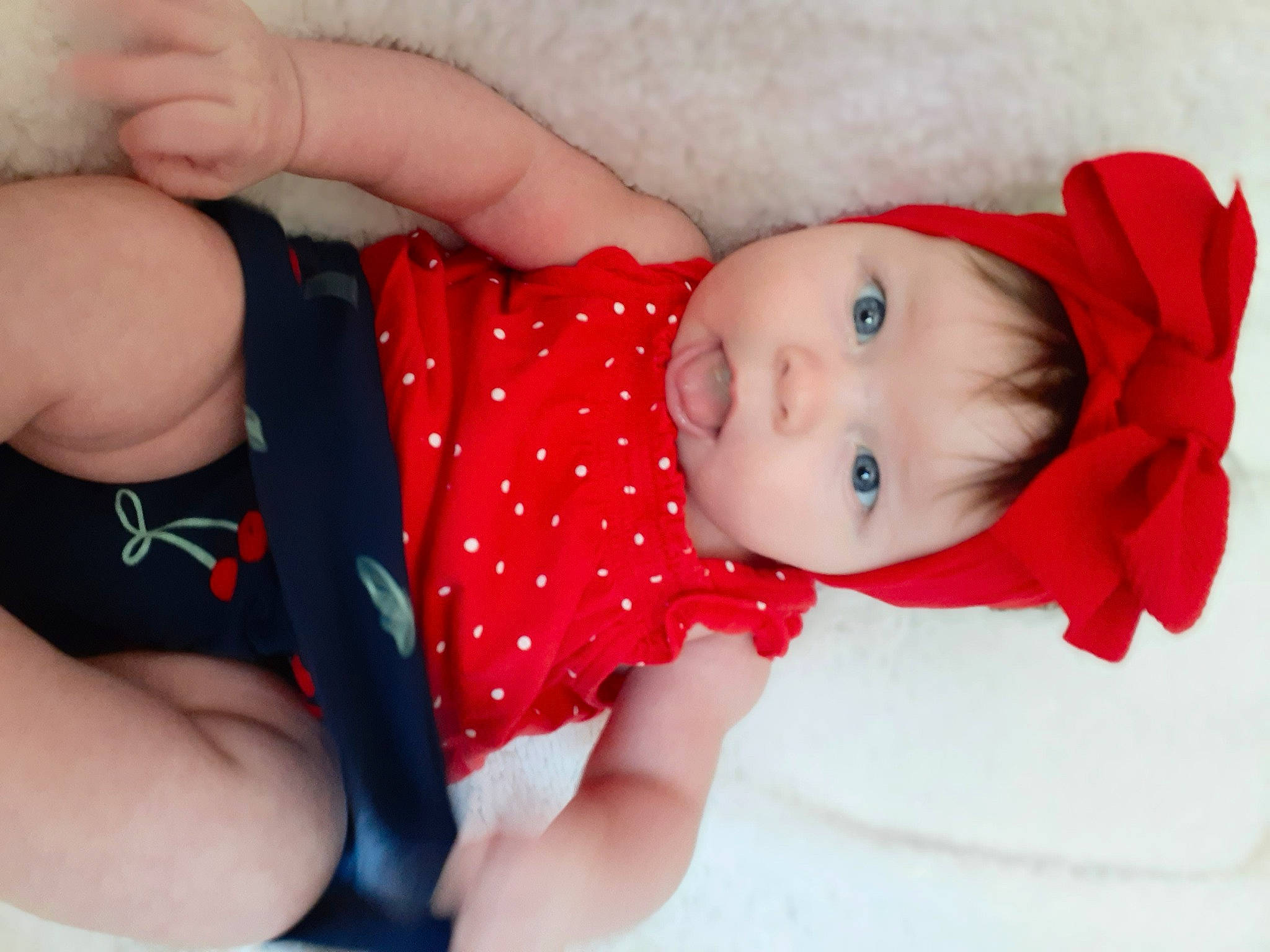 Molly is registered to the contest to win money with this photo: baby, baby_products, baby_toddler_clothing, cheek, child, finger, hand, lip, mouth, person, play, product, red, skin, toddler