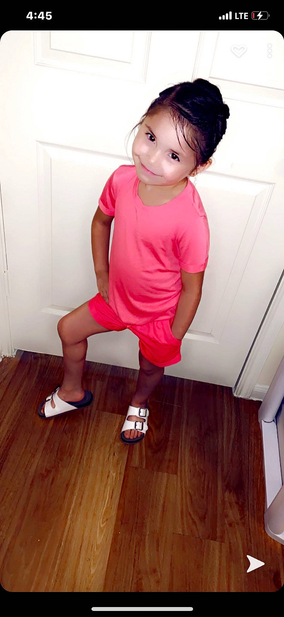 Kayleen is registered to the contest to win money with this photo: baby_toddler_clothing, calf, cheek, floor, flooring, foot, hardwood, human_leg, joy, knee, laminate_flooring, person, pink, sandal, shoe, shoulder, skin, thigh, white, wood