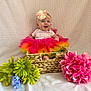 baby, child, tutu, headband, flower, basket, pink, yellow, green, purple, smiling, sitting, fabric, background, happy, cute, portrait, colorful, indoors, decor