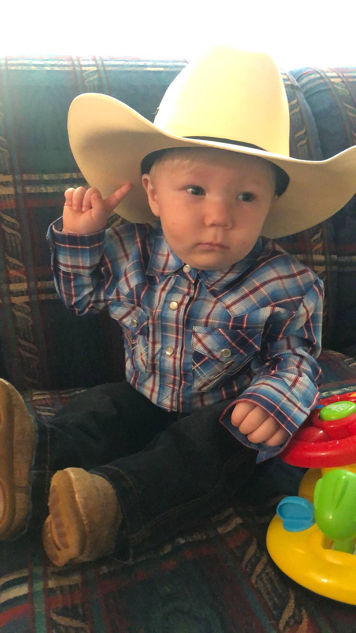 Cole joined the competition — help win amazing prizes! baby, baby_playing_with_toys, baby_products, baby_toddler_clothing, baby_toys, bath_toy, child, cool, costume_accessory, costume_hat, cowboy_hat, hand, hat, headwear, nose, person, plastic, play, rubber_ducky, sun_hat