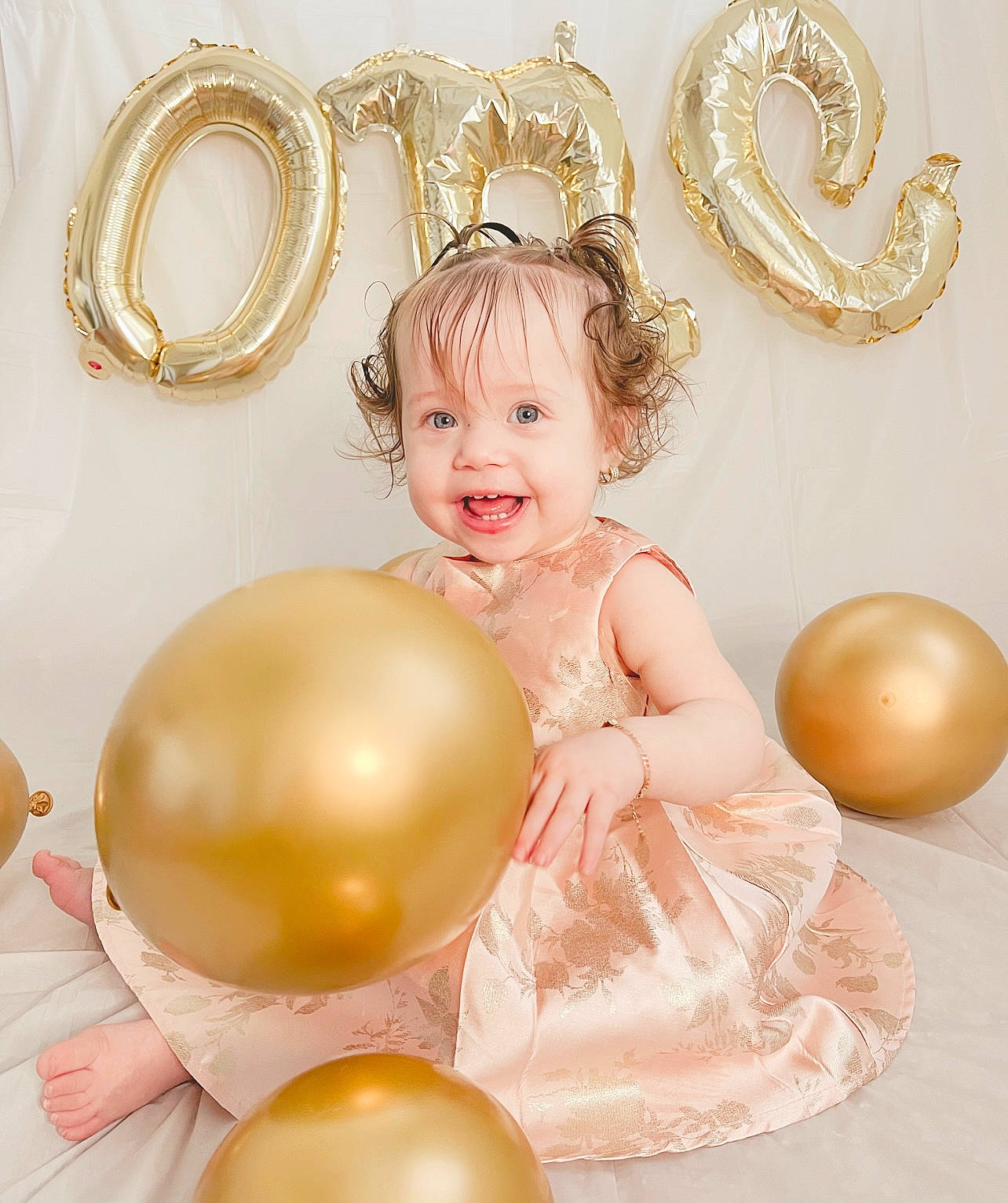 Leilani joined the competition — help win amazing prizes! baby, baby_toddler_clothing, balloon, body_jewelry, child, event, facial_expression, fashion_accessory, happy, head, jewellery, joy, necklace, ornament, party_supply, peach, person, picture_frame, pink, smile