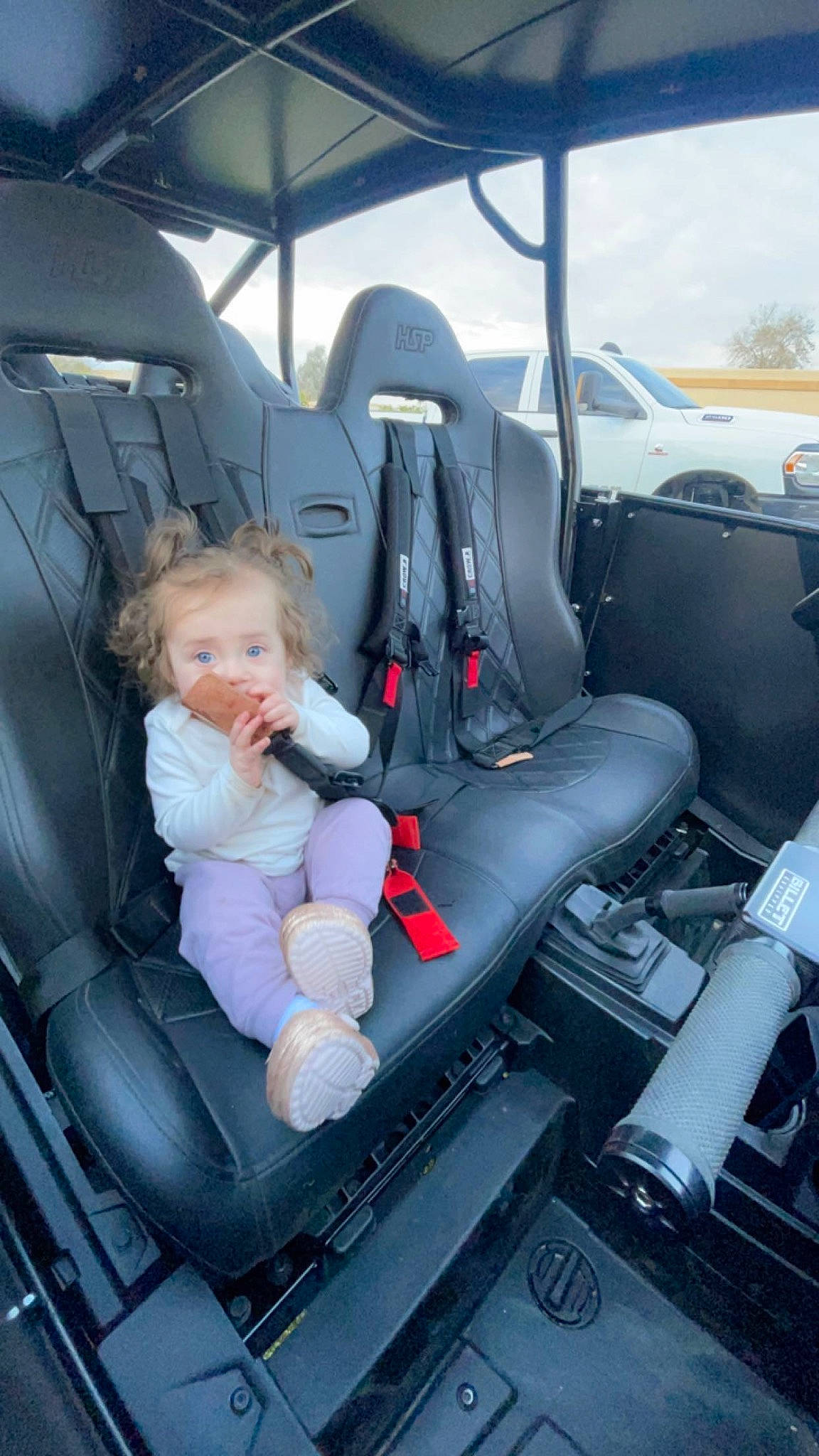 Leilani is registered to the contest to win money with this photo: auto_part, automotive_design, automotive_exterior, baby_toddler_clothing, car, car_seat, car_seat_cover, comfort, family_car, head_restraint, lap, luxury_vehicle, mode_of_transport, motor_vehicle, person, service, sitting, toddler, vehicle, vehicle_door