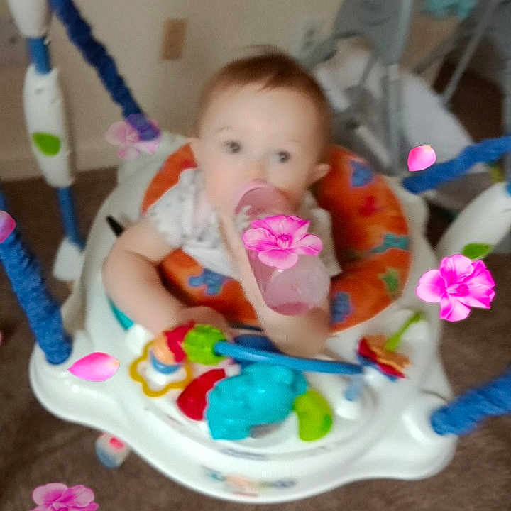 Lorraine is registered to the contest to win money with this photo: baby, baby_mobile, baby_products, baby_toddler_clothing, baby_toys, chair, cheek, child, event, fun, happy, leisure, pink, play, product, room, sitting, skin, sweetness, toddler