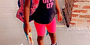 Teighan is registered to the contest to win money with this photo: balloon, child, city, clothing, face, female, footwear, girl, hair, head, person, photography, portrait, road, shoe, shorts, sneaker, street, toy, urban