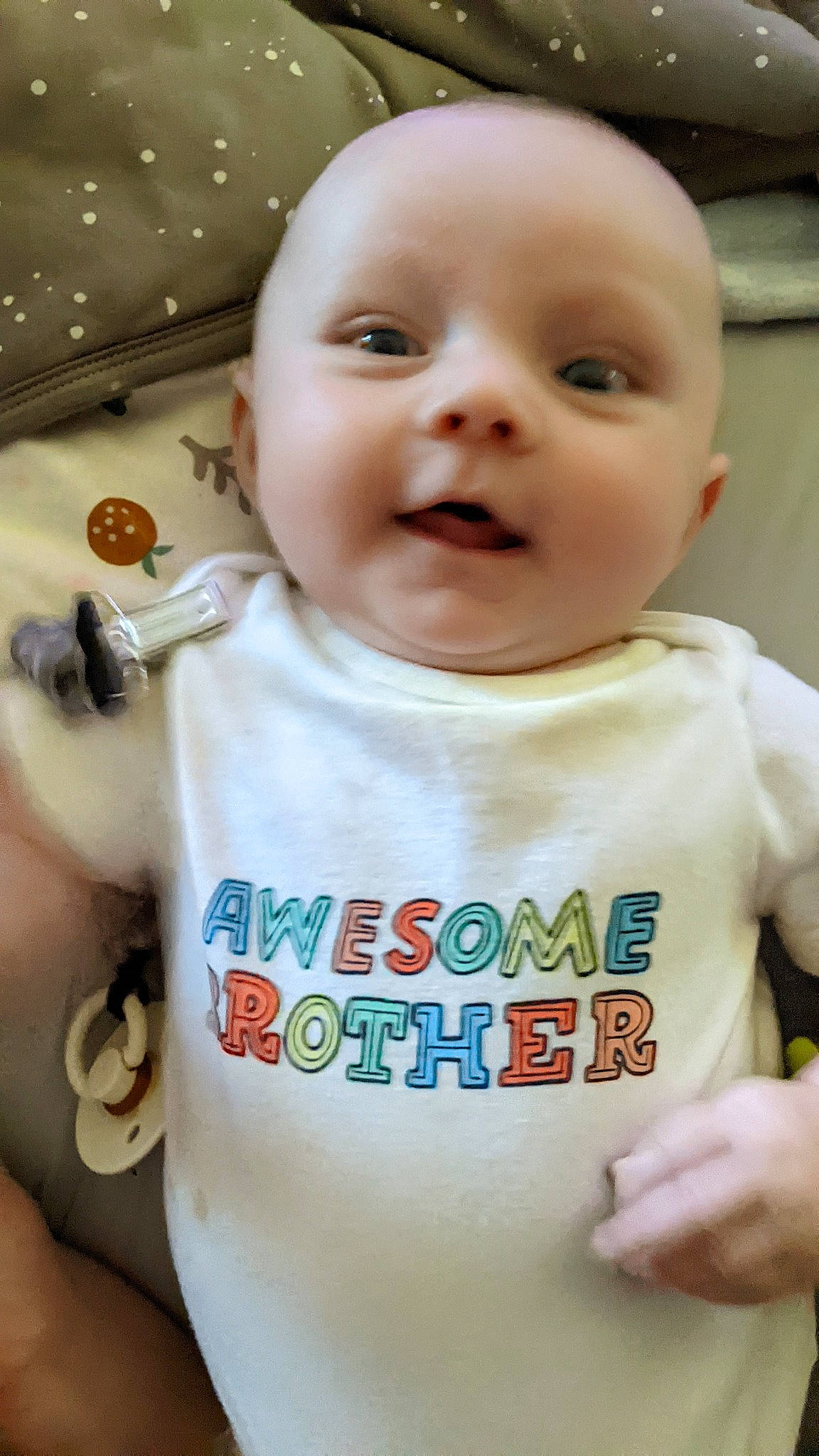 William is registered to the contest to win money with this photo: baby, baby_toddler_clothing, cheek, child, chin, cool, eyebrow, eyelash, facial_expression, happy, iris, mouth, neck, nose, person, product, skin, sleeve, smile, t_shirt