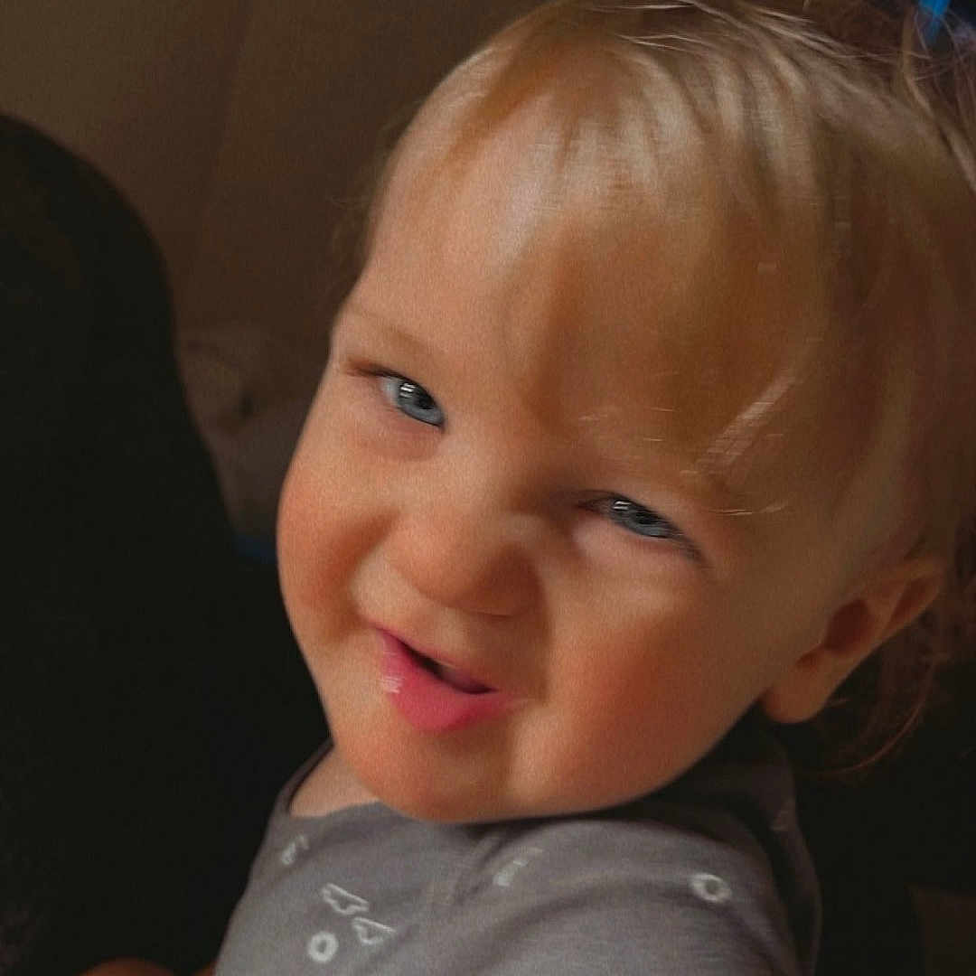 Dutton joined the competition — help win amazing prizes! baby, blonde, bodypart, clothing, couch, face, furniture, hair, happy, head, homedecor, indoors, laughing, mouth, person, photography, portrait, smile, t_shirt, teeth