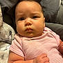 Jaelynn joined the competition — help win amazing prizes! baby, infant, child, face, skin, arm, clothing, onesie, pink, striped, blanket, fist, expression, cute, indoor, portrait, soft, cushion, newborn, person