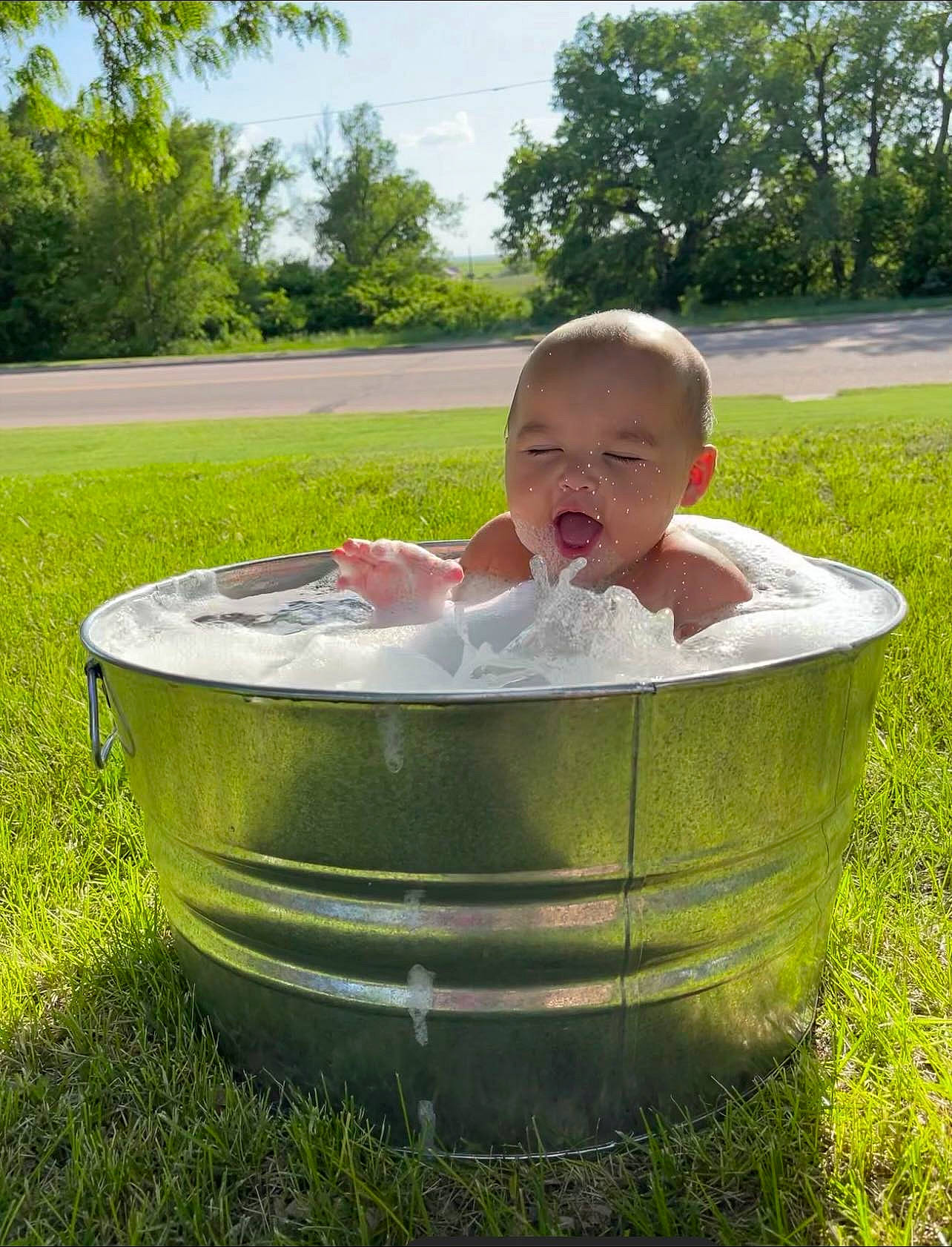 Massiah joined the competition — help win amazing prizes! baby, baby_toddler_clothing, child, composite_material, fun, garden, grass, grass_family, grassland, groundcover, happy, leisure, people_in_nature, person, plant, shrub, sitting, sky, toddler, tree