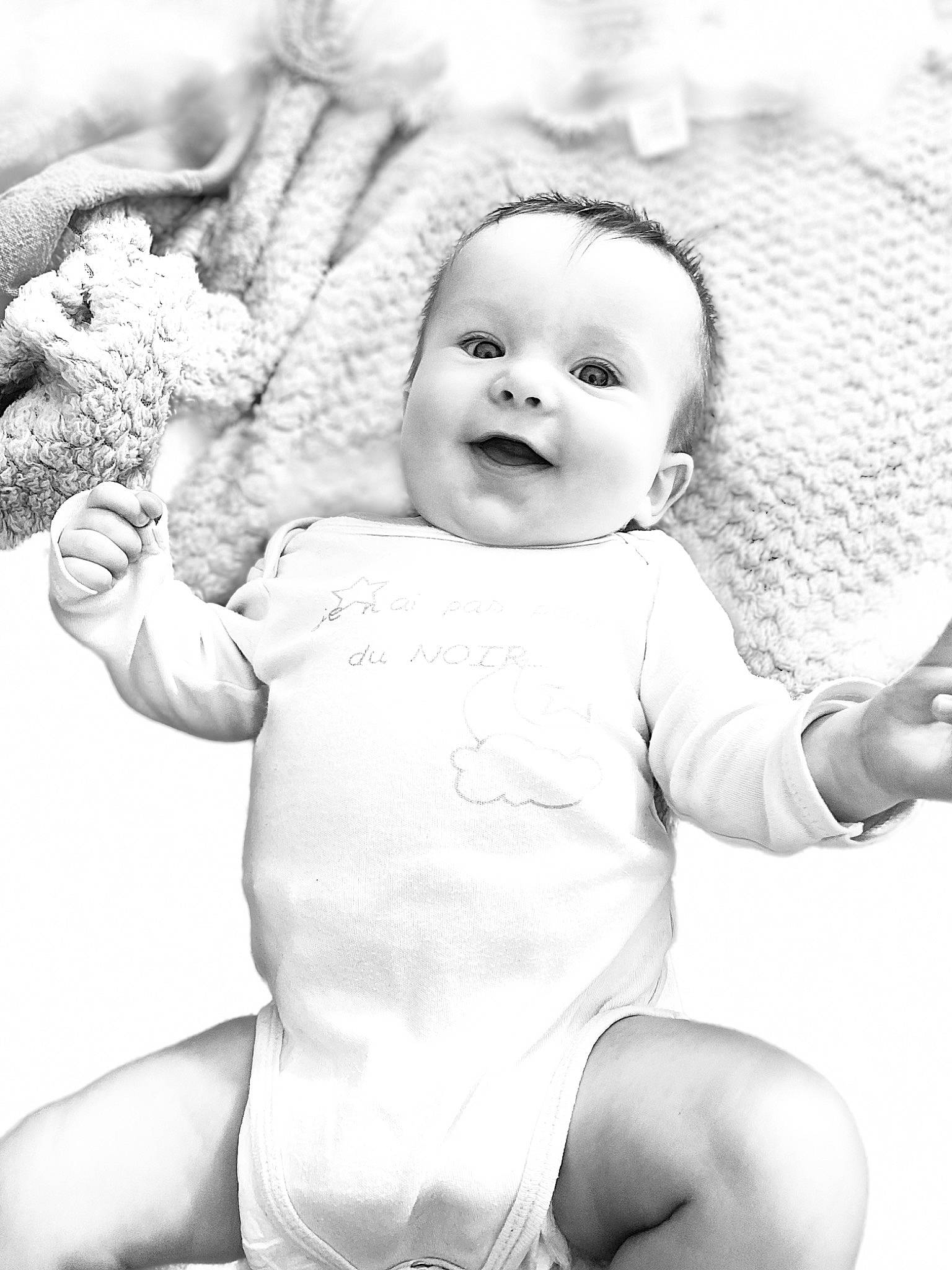Abby participe au concours pour gagner de l'argent avec cette photo : arm, baby, baby_toddler_clothing, black, cheek, eye, face, facial_expression, finger, gesture, happy, head, human_body, person, photograph, product, skin, smile, standing, style