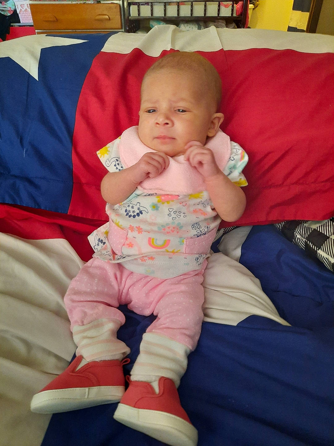 Angel joined the competition — help win amazing prizes! baby, baby_toddler_clothing, cheek, child, comfort, couch, finger, flooring, fun, human_leg, knee, lap, person, pink, product, red, sitting, skin, sock, thigh