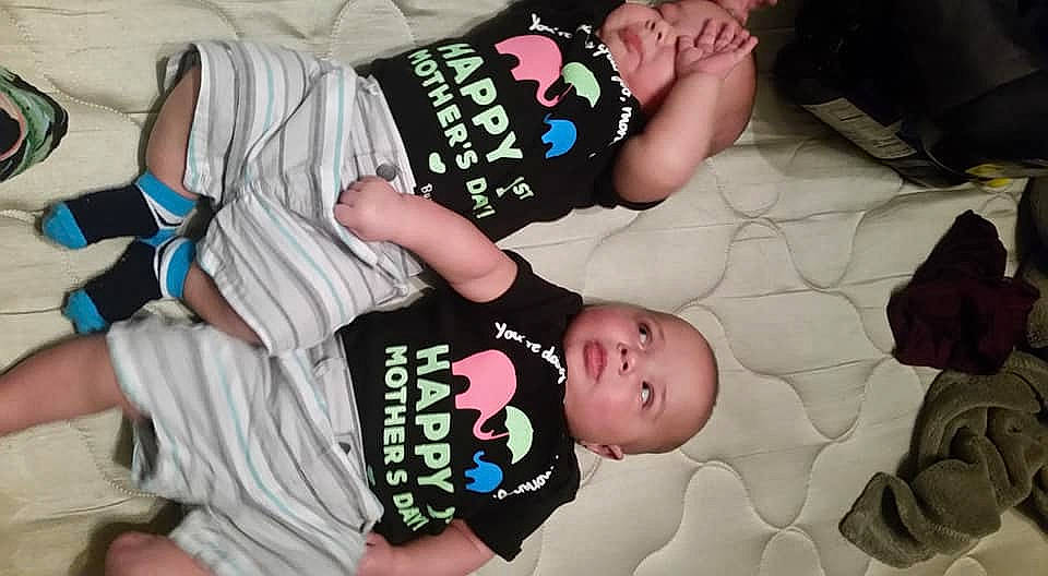 Byron is registered to the contest to win money with this photo: baby, child, cool, finger, person, product, t_shirt, toddler