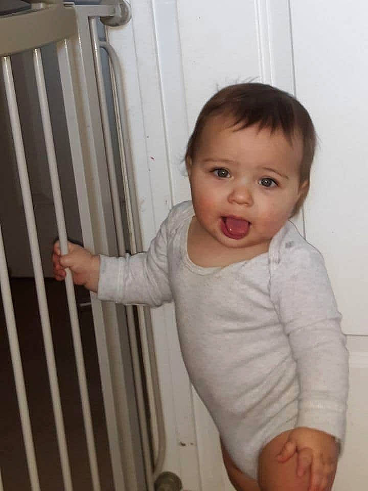 Byron is registered to the contest to win money with this photo: arm, baby, baby_products, baby_safety, baby_toddler_clothing, cheek, child, face, person, product, skin, smile, standing, toddler