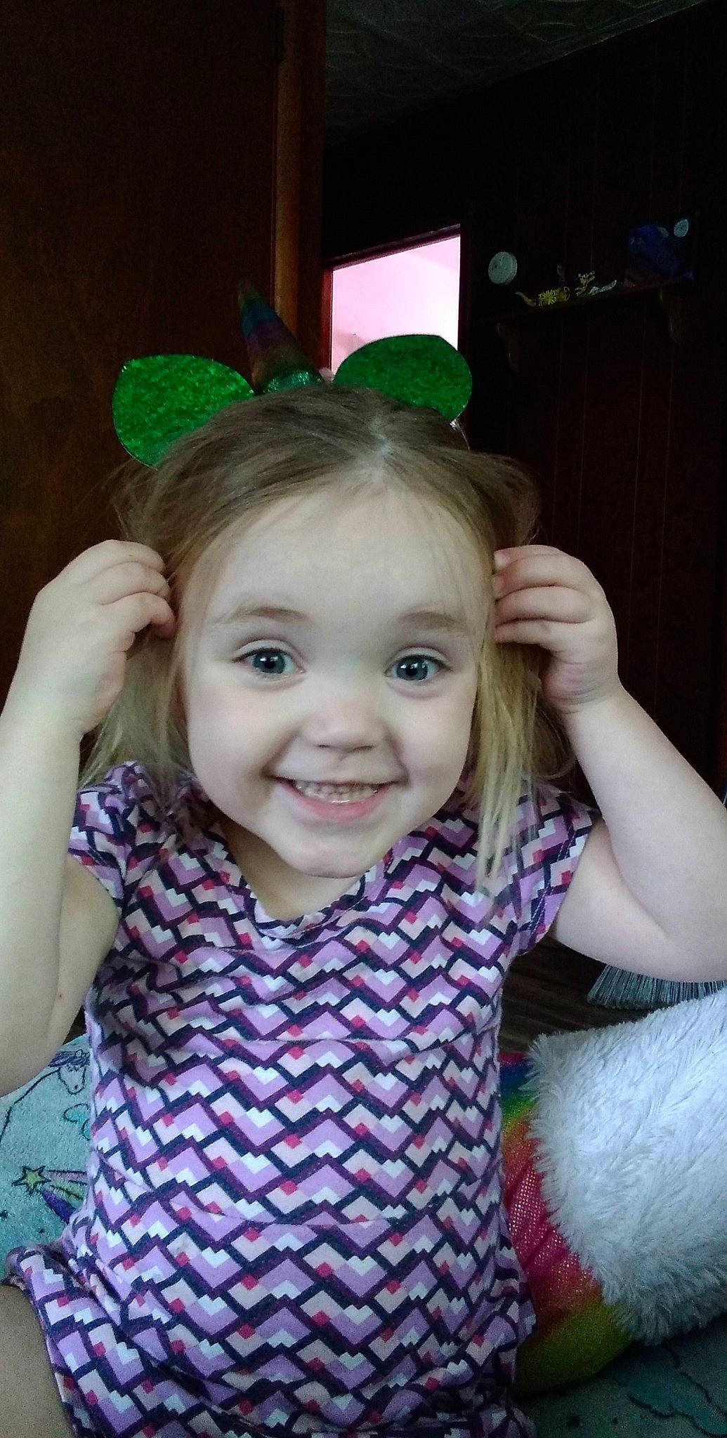 Waverly is registered to the contest to win money with this photo: arm, cheek, chin, ear, eye, eyebrow, eyelash, face, forehead, green, hairstyle, head, human_body, iris, joy, leaf, lip, neck, organ, person