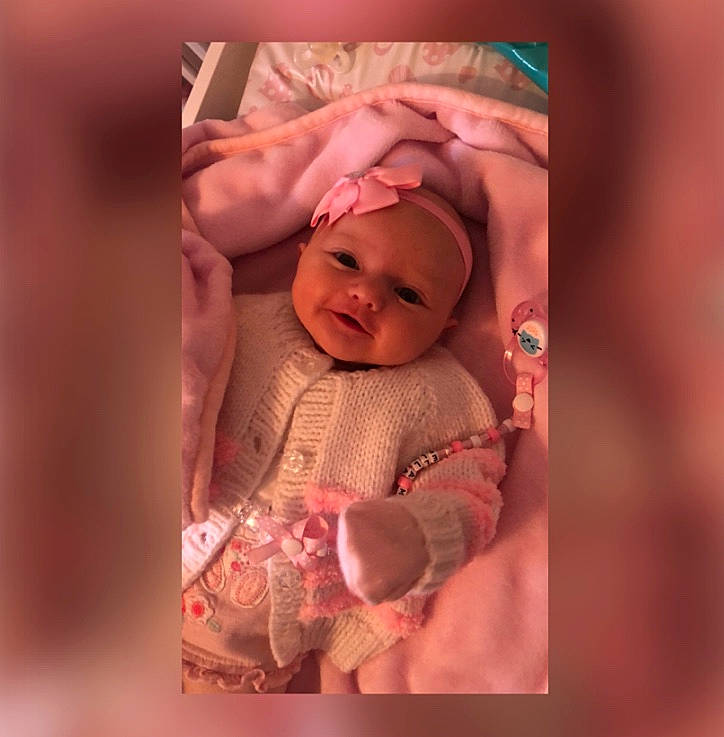 Ella-mae is registered to the contest to win money with this photo: baby, child, headwear, peach, person, photography, pink, smile, toddler