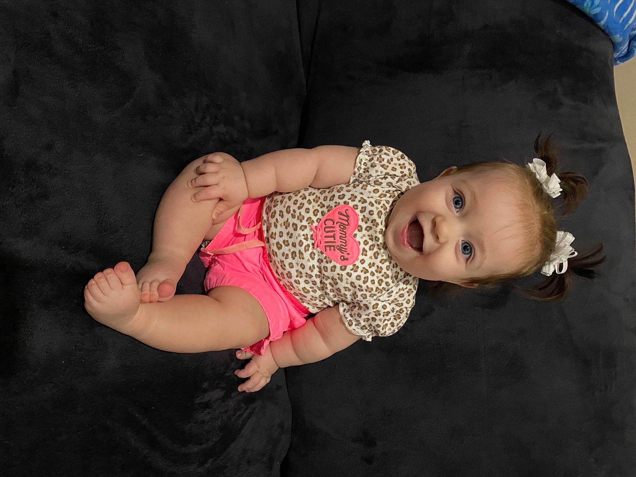 Coral joined the competition — help win amazing prizes! baby, baby_toddler_clothing, cheek, child, comfort, embellishment, flash_photography, fun, happy, headgear, iris, pattern, person, sitting, skin, sleeve, sock, textile, toddler, wood