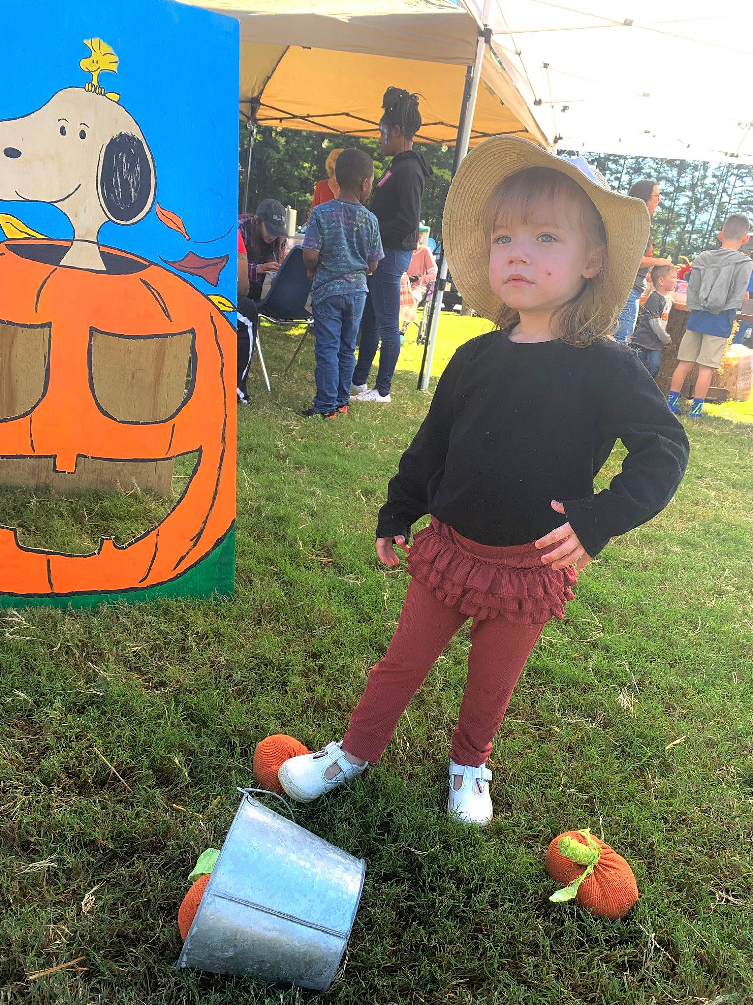 Knoxlynn joined the competition — help win amazing prizes! art, ball, child, event, football, fun, grass, green, hat, leisure, mammal, orange, person, player, recreation, shorts, sports_equipment, t_shirt, tent, toddler
