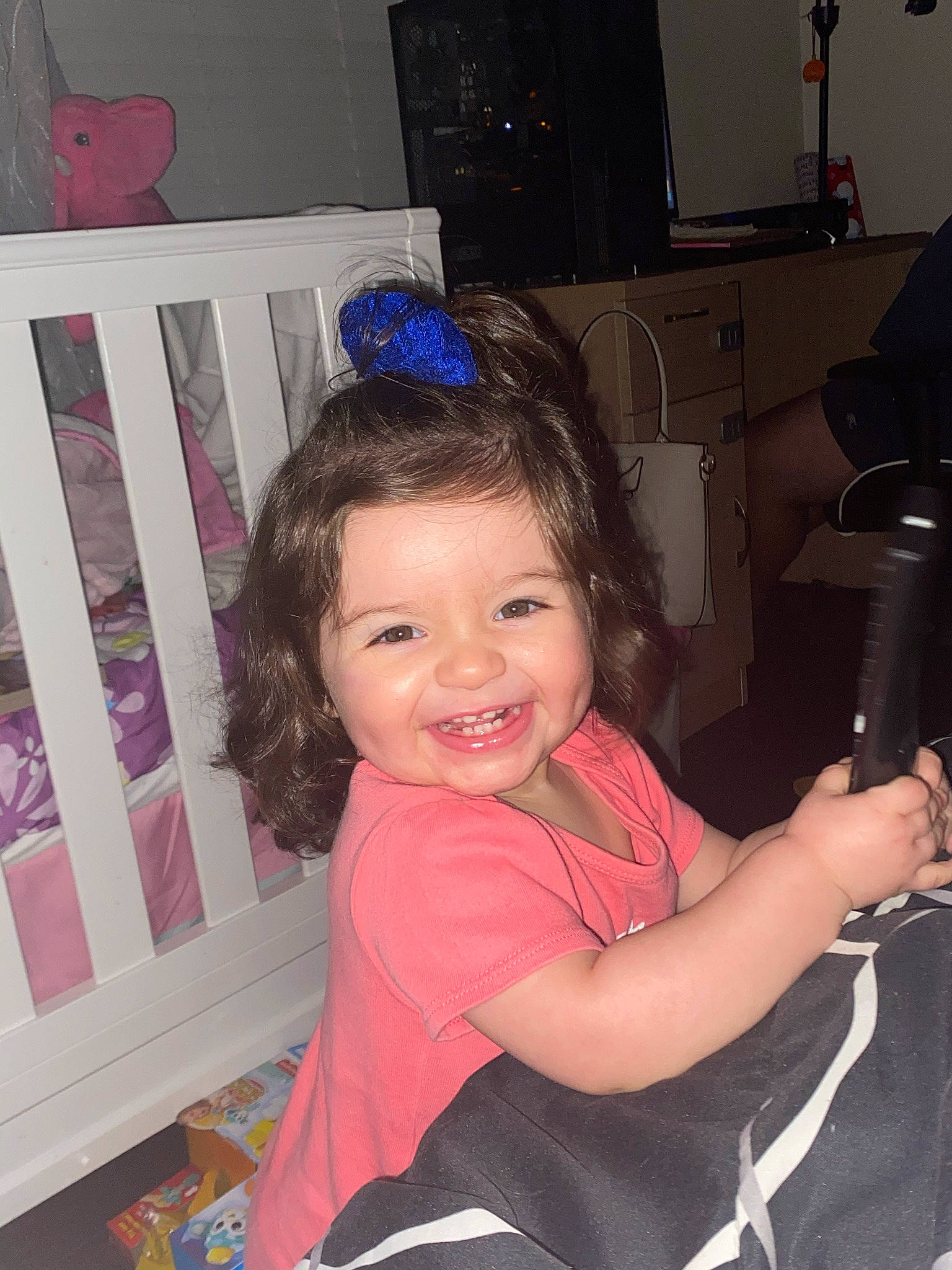 Briana joined the competition — help win amazing prizes! baby_products, baby_toddler_clothing, camera, child, eye, hair_accessory, joy, lamp, lavender, nursery, party_hat, person, pink, purple, room, smile, toddler, tooth, video_camera