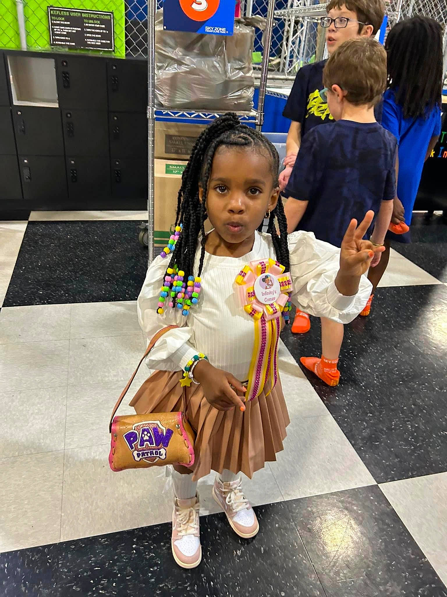 Infinity is registered to the contest to win money with this photo: bag, child, costume, event, fashion_design, flooring, fun, hair, happy, human_leg, jewellery, leisure, luggage_and_bags, person, public_space, recreation, room, sandal, street, toddler