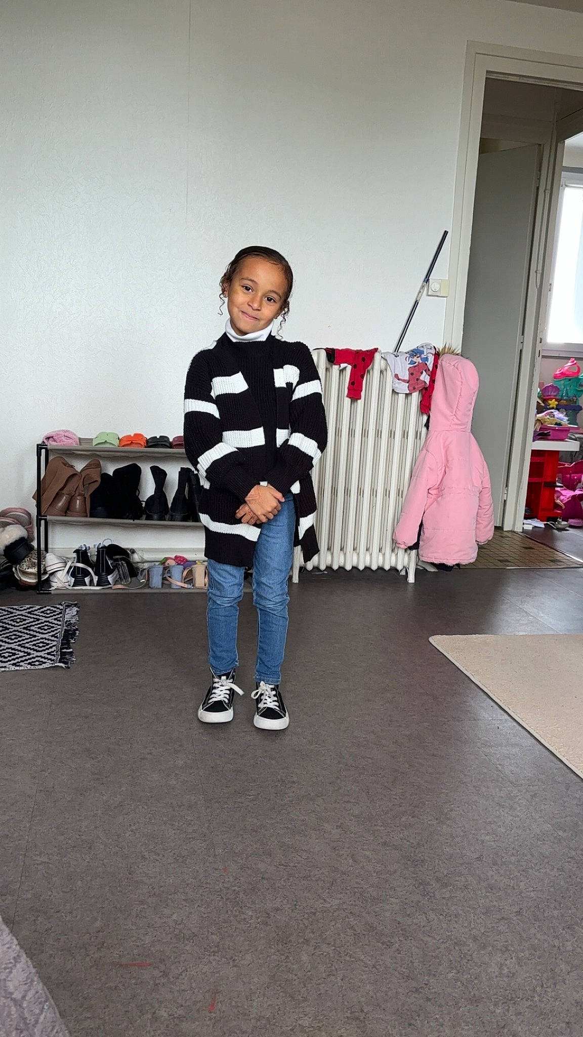 Iryna participe au concours pour gagner de l'argent avec cette photo : automotive_design, backpack, bag, boot, costume, curtain, denim, fashion_design, floor, flooring, fun, handbag, joy, knee, luggage_and_bags, person, room, sleeve, sportswear, stairs