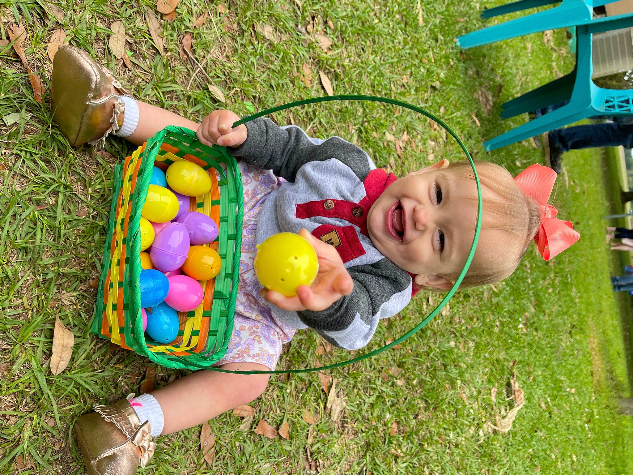 Maddelynn is registered to the contest to win money with this photo: baby, ball, child, easter, easter_egg, fun, grass, happy, joy, lawn, leisure, people_in_nature, person, plant, play, recreation, shoe, smile, sports_equipment, sports_toy