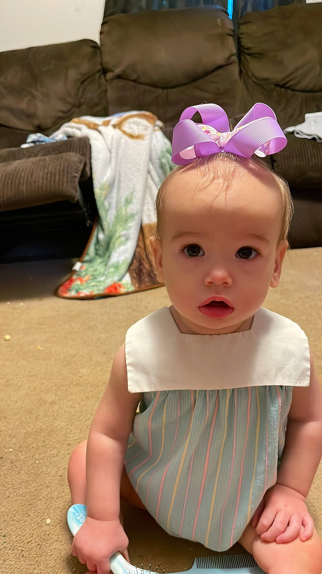 Maddelynn joined the competition — help win amazing prizes! baby, baby_toddler_clothing, blue, child, costume_hat, eye, eyelash, fashion_accessory, fun, happy, headband, headpiece, iris, jewellery, person, petal, pillow, pink, purple, toddler