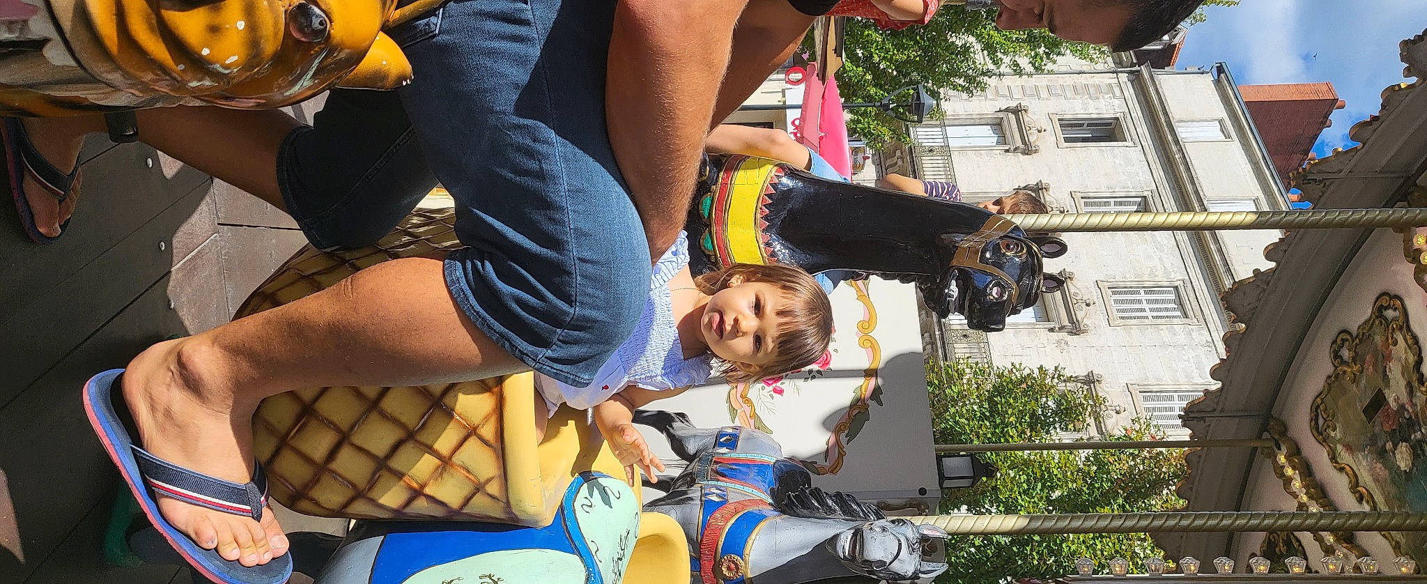 Natalia participe au concours pour gagner de l'argent avec cette photo : baby_products, child, city, competition_event, fun, happy, human, human_leg, leisure, outdoor_play_equipment, person, plant, recreation, shorts, summer, t_shirt, thigh, toddler, tree, vacation