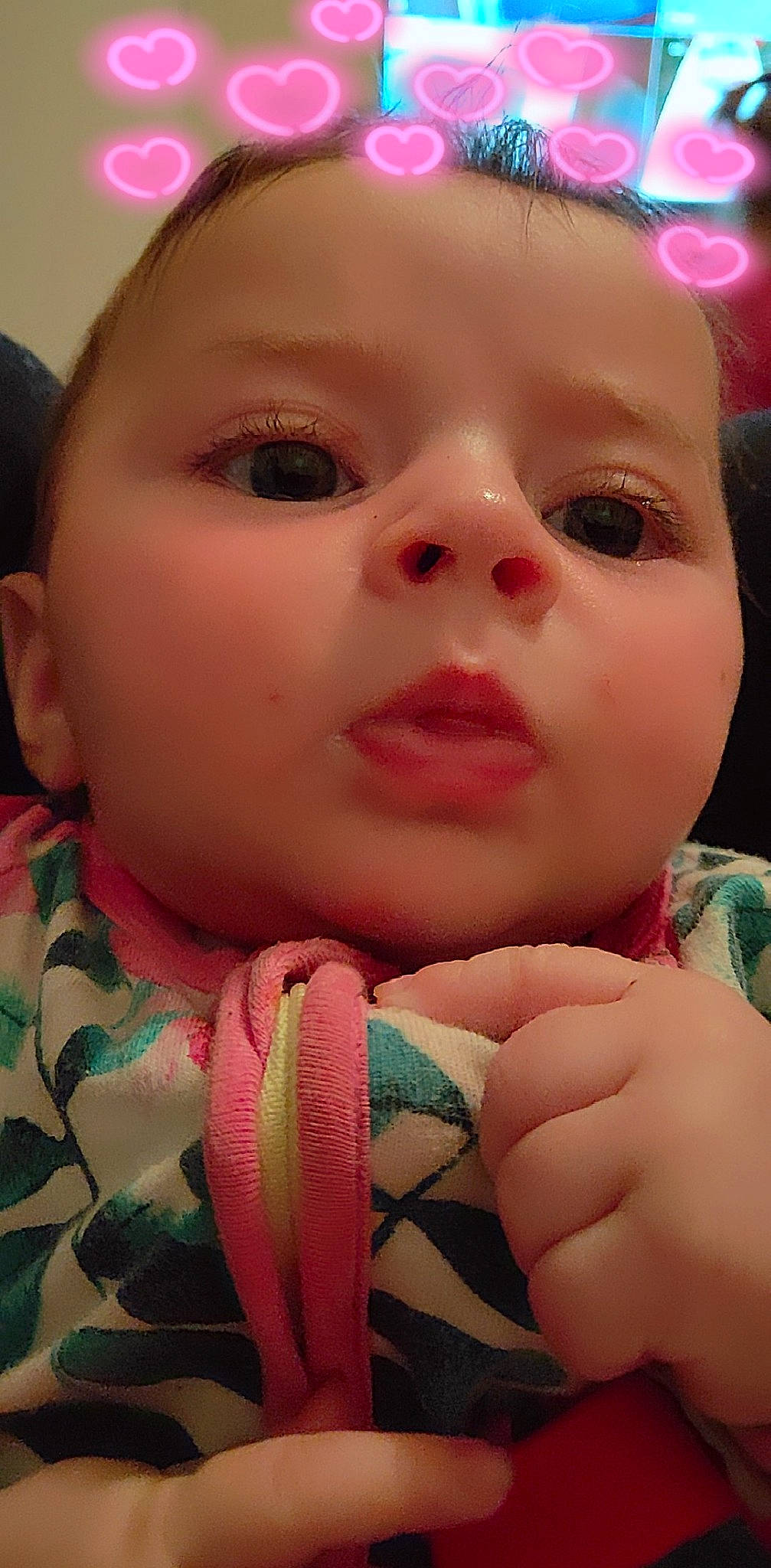 Maddy is registered to the contest to win money with this photo: baby, cheek, child, chin, close_up, ear, eye, eyebrow, face, facial_expression, forehead, head, headwear, iris, lip, mouth, nose, organ, person, pink
