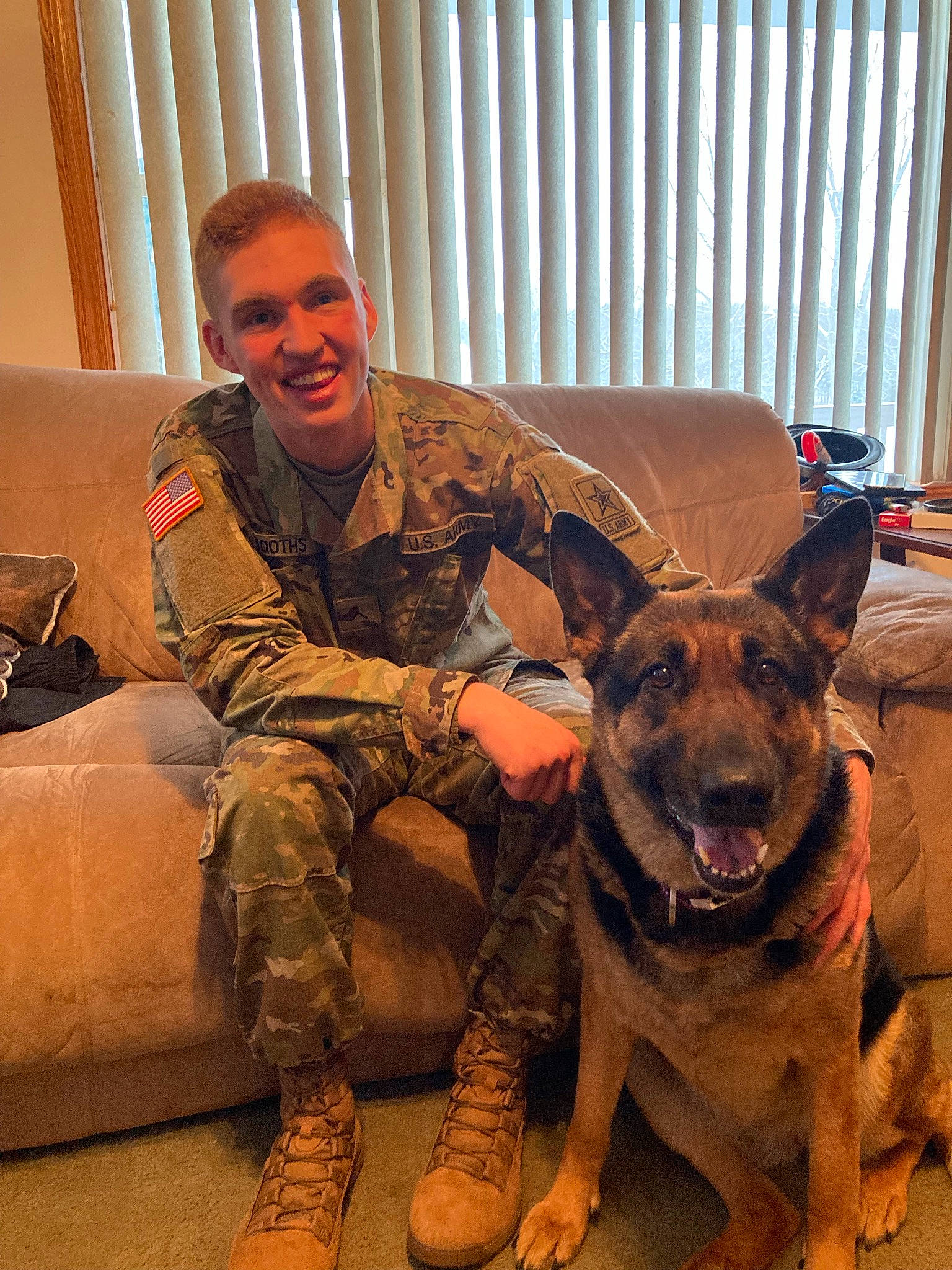 Nadia joined the competition — help win amazing prizes! army, boot, camouflage, cargo_pants, carnivore, companion_dog, curtain, dog, dog_breed, fawn, german_shepherd_dog, marines, military_camouflage, military_organization, military_person, military_uniform, smile, snout, soldier, sporting_group