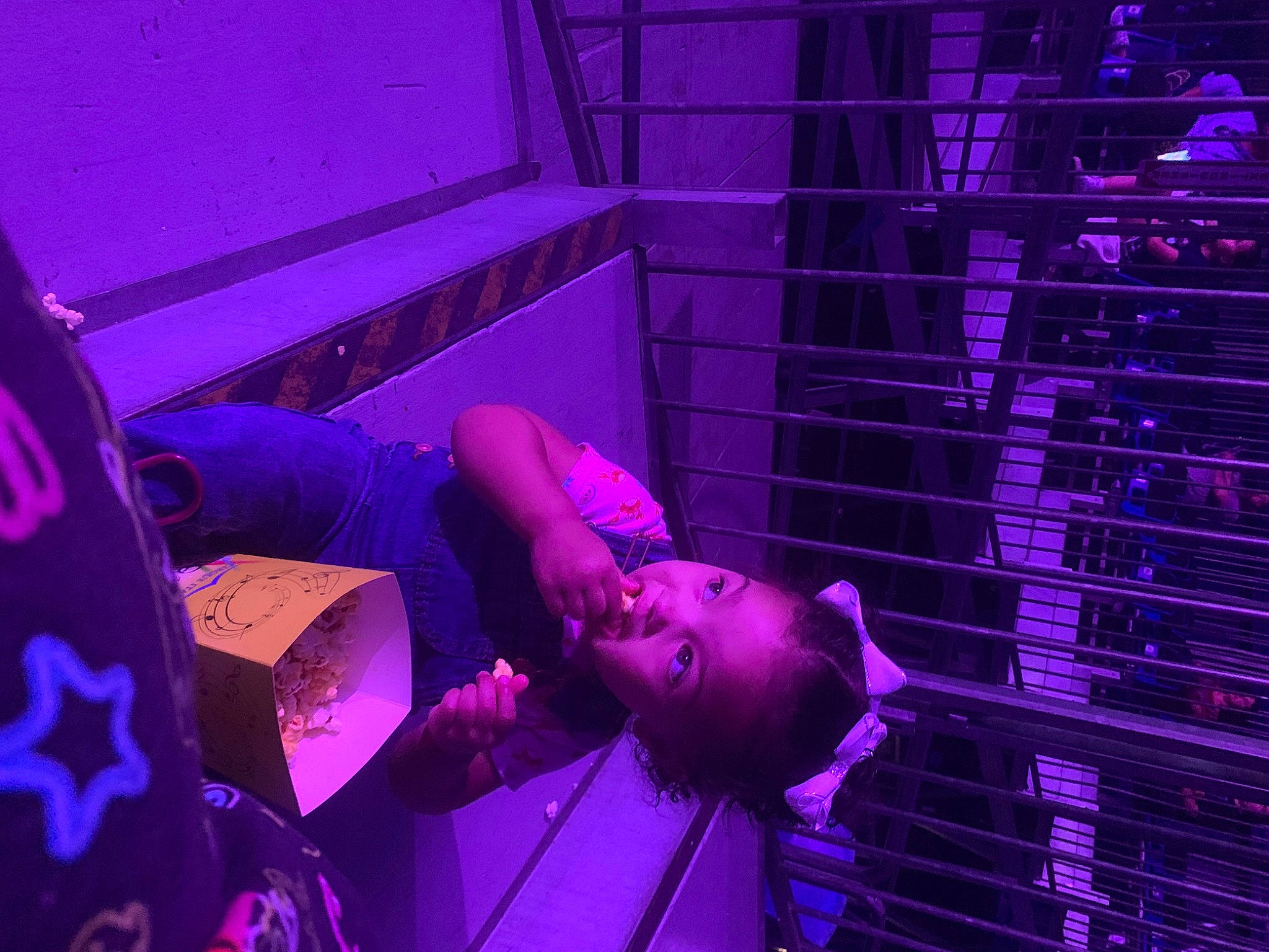 Milani is registered to the contest to win money with this photo: artist, electric_blue, entertainment, event, fun, human_body, magenta, microphone, music, musician, performance, performance_art, performing_arts, person, pink, plant, public_event, purple, room, tree