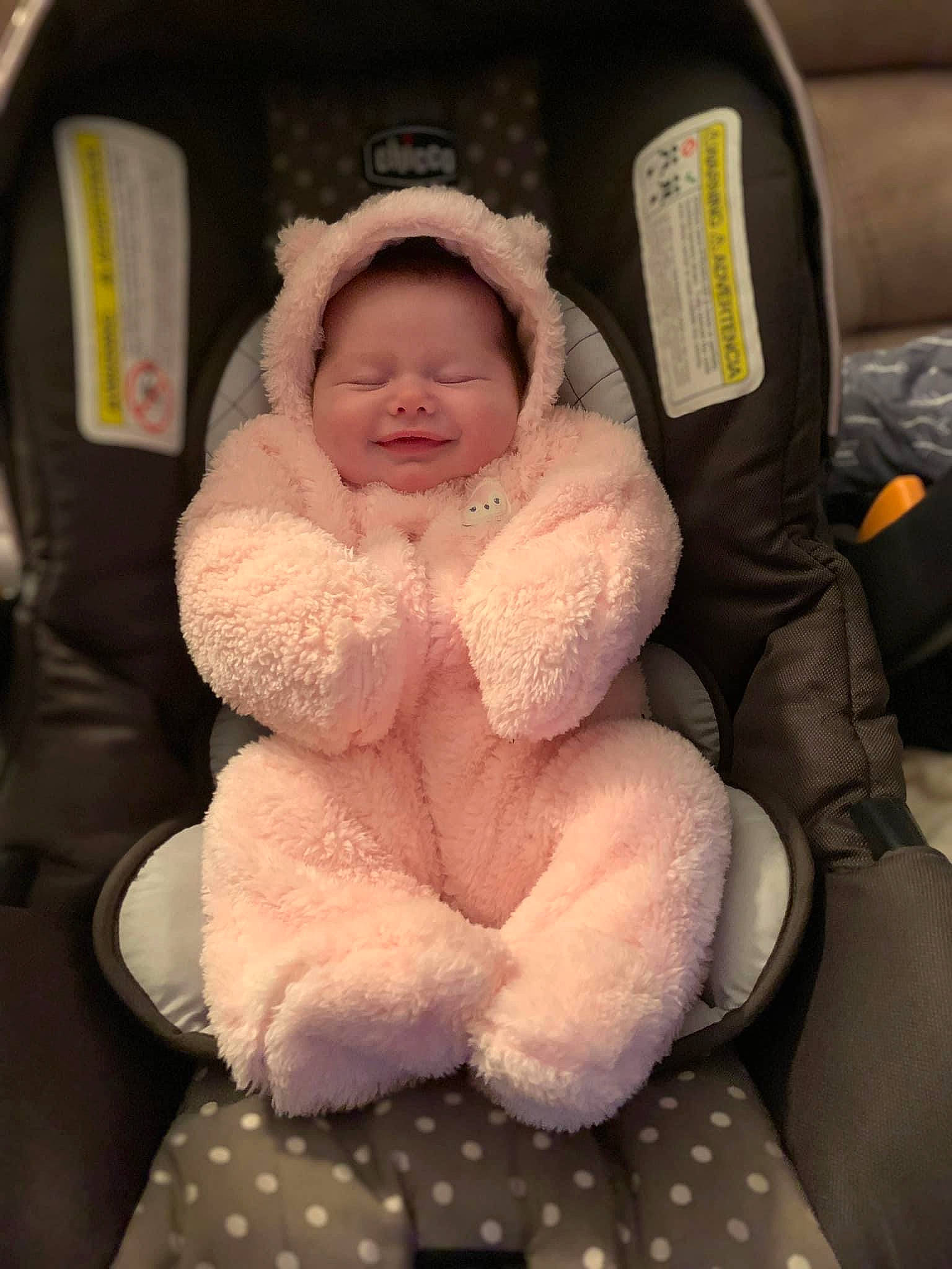 Ainsley is registered to the contest to win money with this photo: baby, baby_carriage, baby_products, baby_safety, baby_toddler_clothing, car_seat, chair, cheek, child, comfort, eye, joy, lap, pattern, person, seat_belt, sitting, skin, sleeve, smile