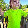 Kolton is registered to the contest to win money with this photo: toddler, child, neon_shirt, outdoor, daylight, blue_sky, greenery, wooden_deck, smiling, short_hair, person, summer_clothing, playful, casual, sunny, portrait, nature, happy, young_child, bright_colors