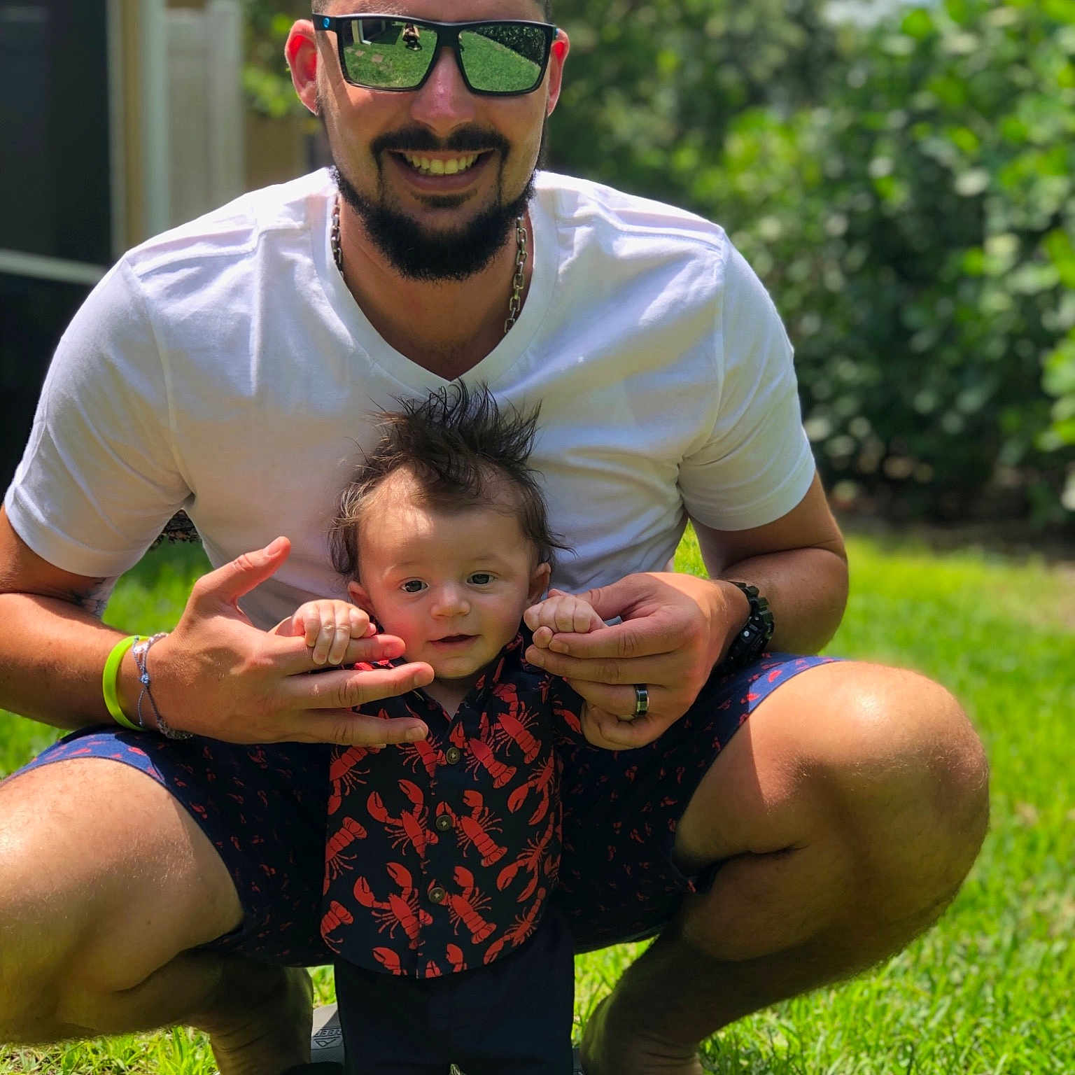 Kace is registered to the contest to win money with this photo: child, father, fun, glasses, grass, green, happy, headwear, joy, lawn, male, people, person, photography, plant, toddler, vacation