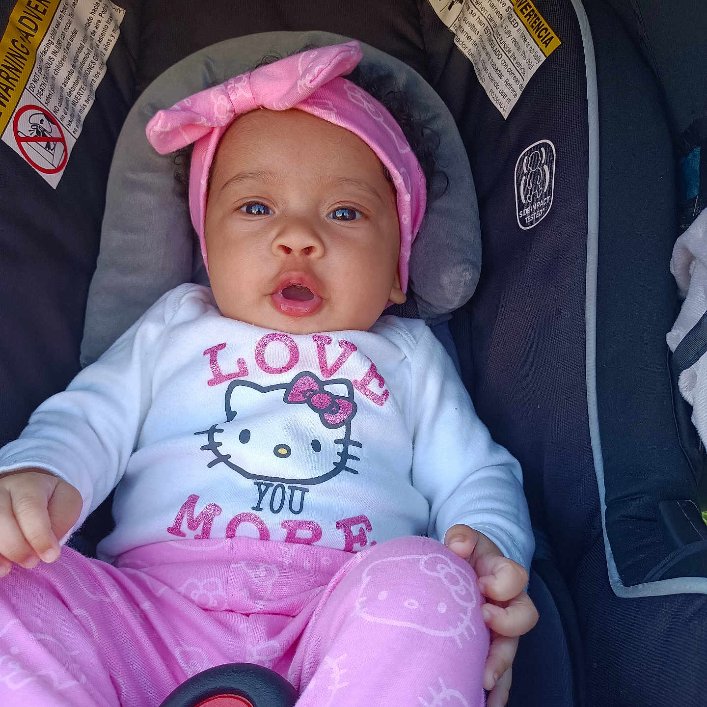 Malayah joined the competition — help win amazing prizes! baby, bed, bonnet, cap, car, car_interior, carseat, clothing, crib, cushion, face, furniture, hat, head, infantbed, person, photography, portrait, transportation, vehicle