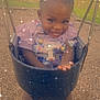 Samiera is registered to the contest to win money with this photo: toddler, child, swing, playground, smiling, happy, outdoor, shoes, curly_hair, dress, safety_harness, wood_chips, grass, play_equipment, joyful, cute, daylight, park, sparkle_effect, fun