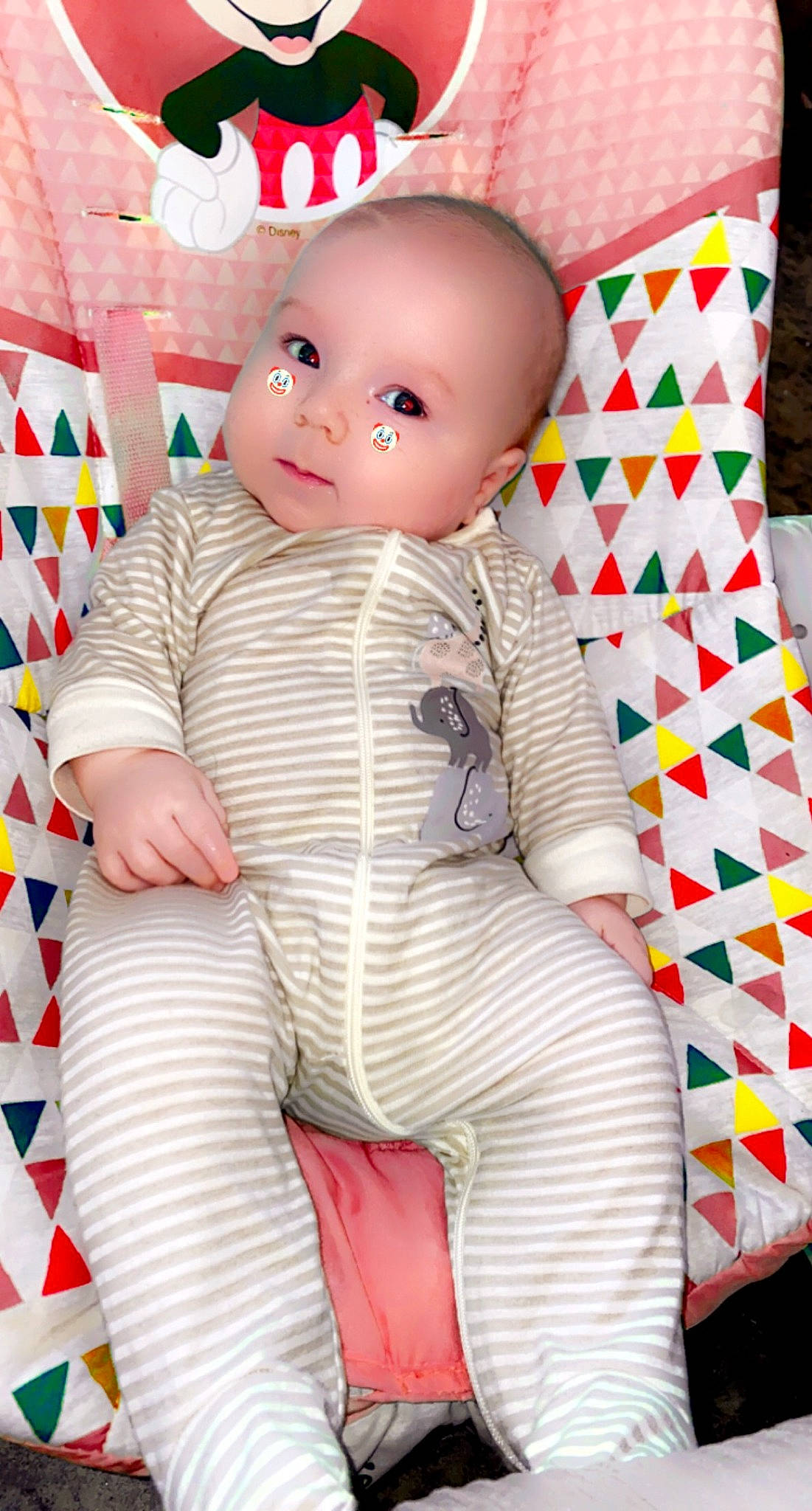 Luke Ashelie is registered to the contest to win money with this photo: baby, baby_toddler_clothing, bedding, carmine, cheek, child, comfort, doll, linens, pattern, person, pink, plastic, red, room, sitting, sleeve, textile, thigh, toy