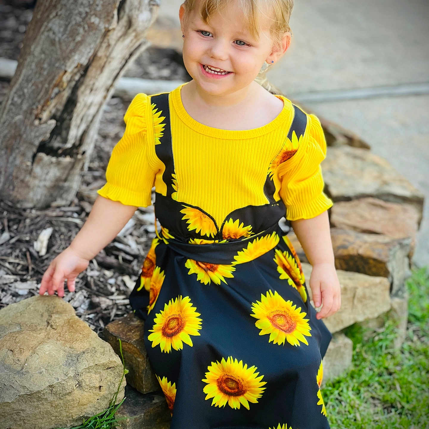 Everleigh joined the competition — help win amazing prizes! boy, child, clothing, dress, face, flower, formalwear, grass, happy, head, herbal, herbs, male, person, petal, photography, plant, portrait, rock, smile